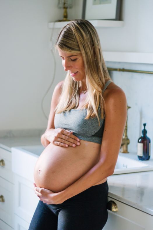 Looking at pregnant belly